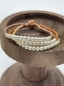 Preview: Spezielles Perlarmband mit schöner Kombination aus drei Brauntönen.