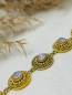 Preview: Goldenes Armband mit runden Amuletten und blauem Swarovski Stein "Sylvie" - Une Ligne