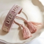 Preview: Gewobenes Armband in Alrosa/Weiss "Lebe Liebe Lache"